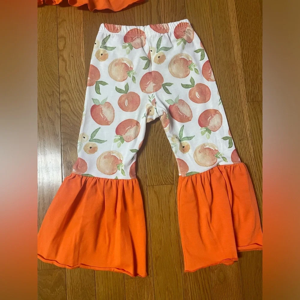 Orange Ruffle Top and peach Print‎ Pants with flare Set 3T